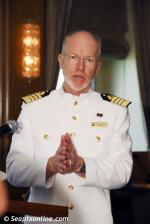ID 3769 QUEEN MARY 2 (2003/148528grt/IMO 9241061) - Captain Christopher Rynd addresses the New Zealand media during an official press briefing held during QM2's stop-over in Auckland, NZ.